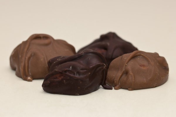 2 milk and 2 dark chocolate covered almond clusters.