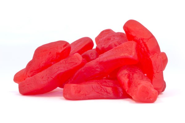 A bunch of red Swedish Fish gummies.