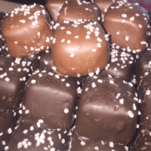 A bunch of caramels sprinkled with sea salt.