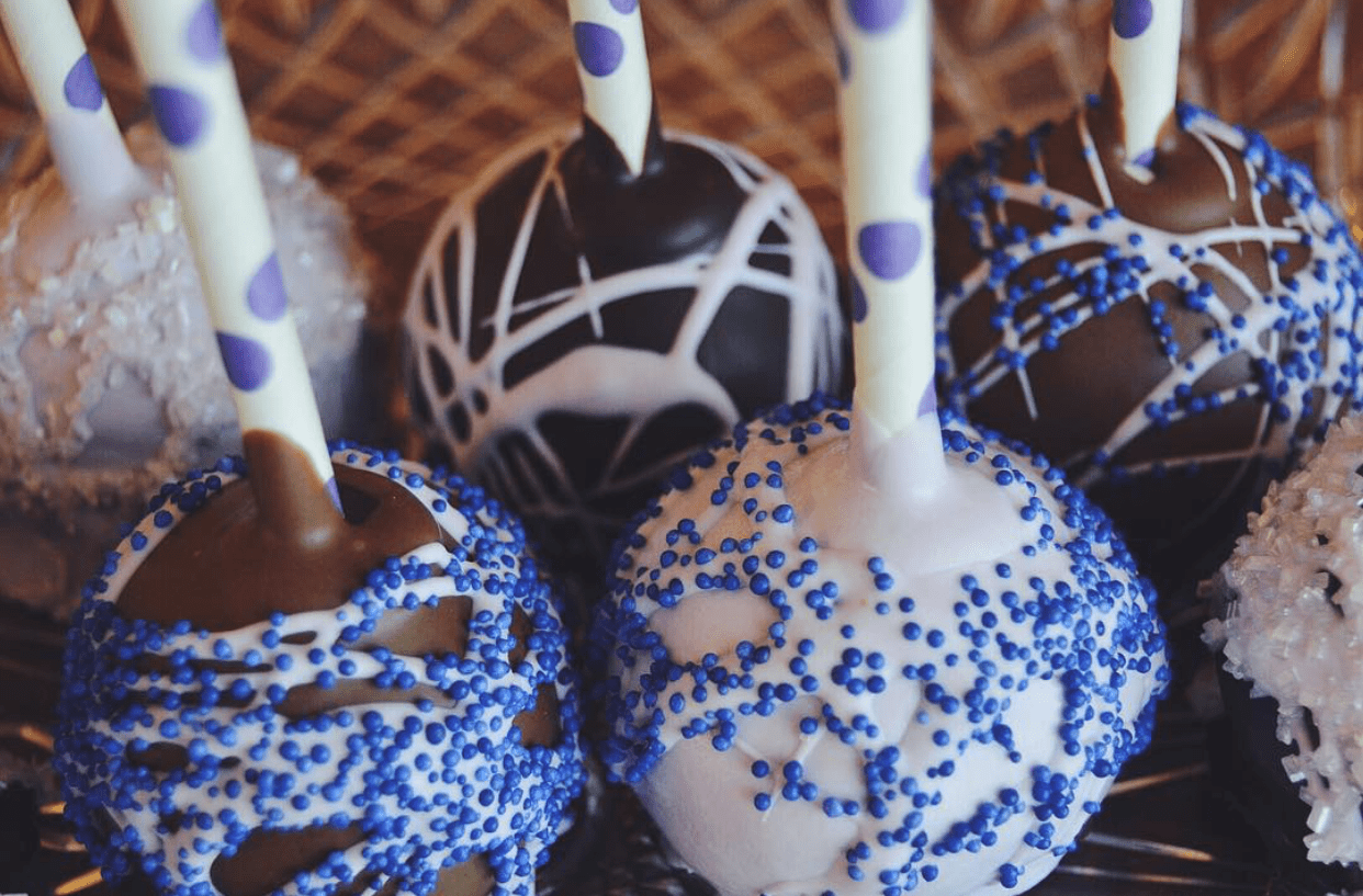 An assortment of blue themed cake pops.