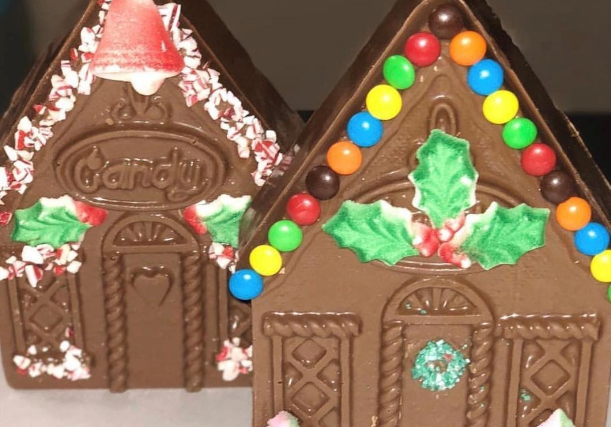 A display of chocolate gingerbread houses.