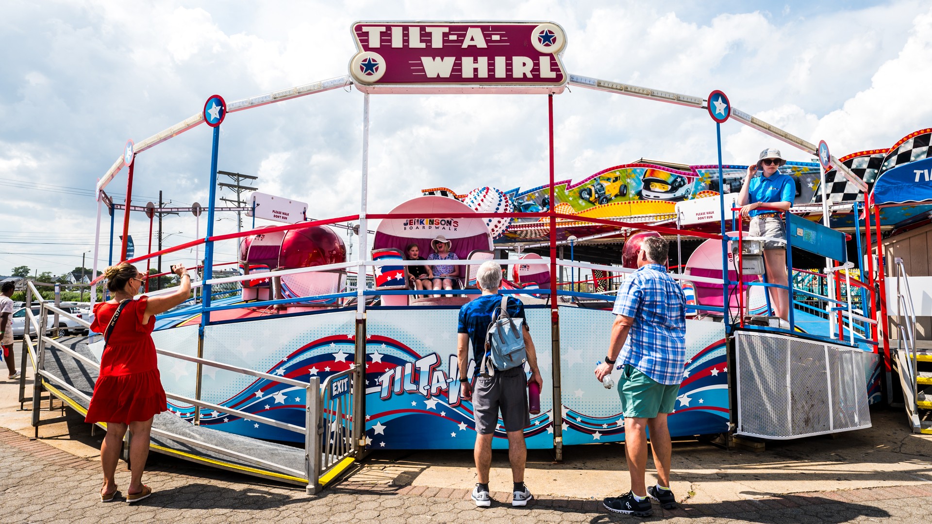 Visitors enjoy Tilt-A-Whirl