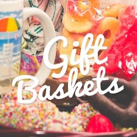 The word "Gift Baskets" with all the snacks and gifts that go in them, in the background.