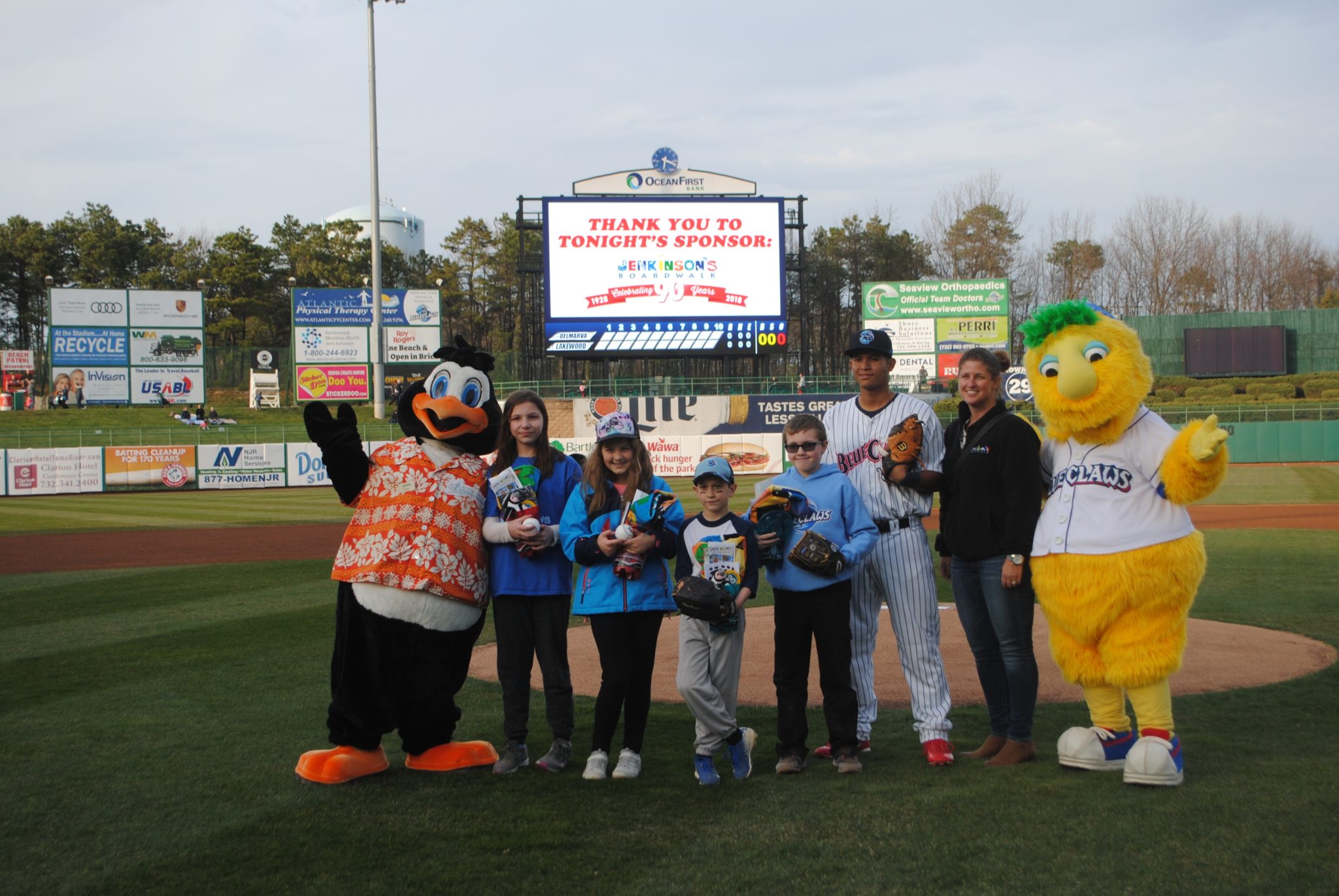 Mascots and fans on The Blueclaw's opening night in 2018 in Lakewood, NJ.
