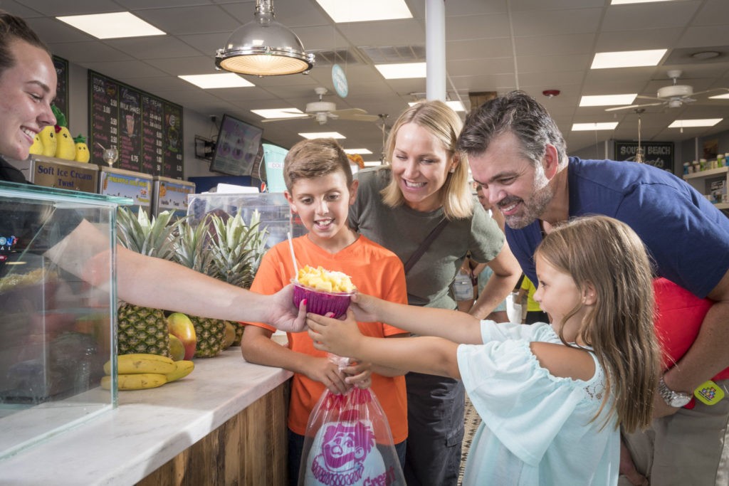 Picture of a family at South Beach Sweets, Bowls & Smoothies on Jenksinson's Boardwalk.