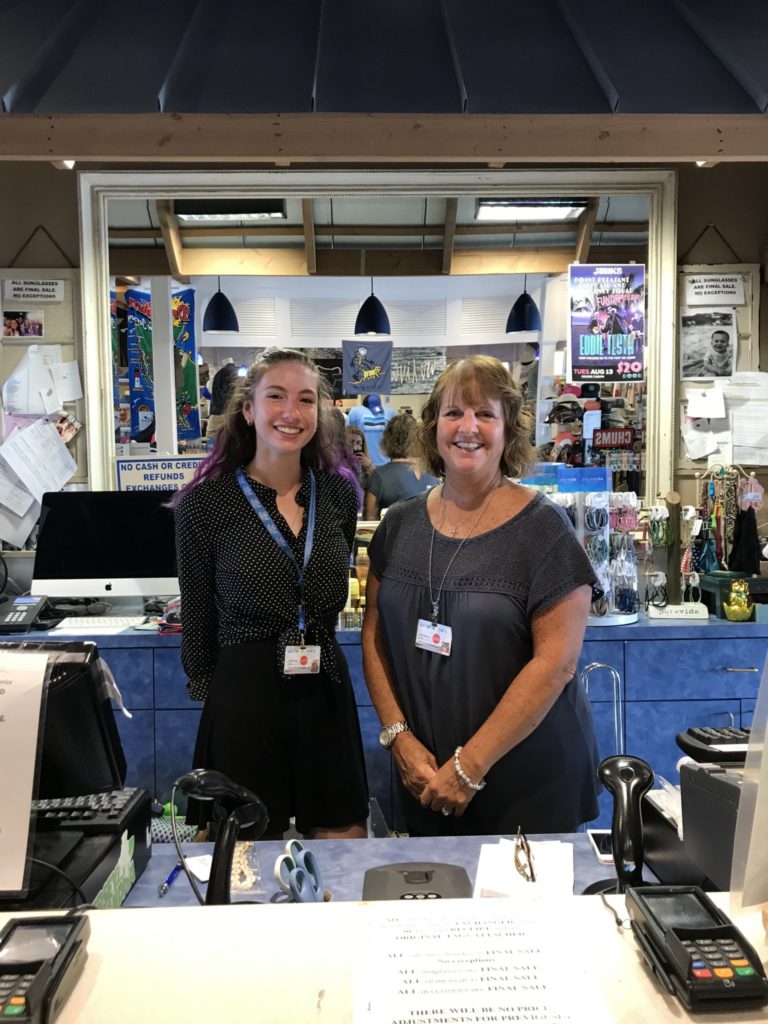 Two employees at The Deep Blue Boutique at Jenkinson's Boardwalk.