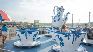 A photo of the blue and white tea cups spinning ride at the Jenkinson's Amusement Park