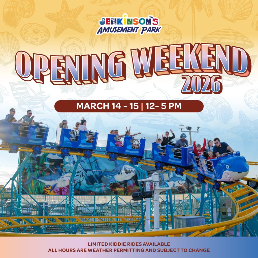 Families riding a blue kiddie coaster at Jenkinson’s Amusement Park with Opening Weekend 2026 details.