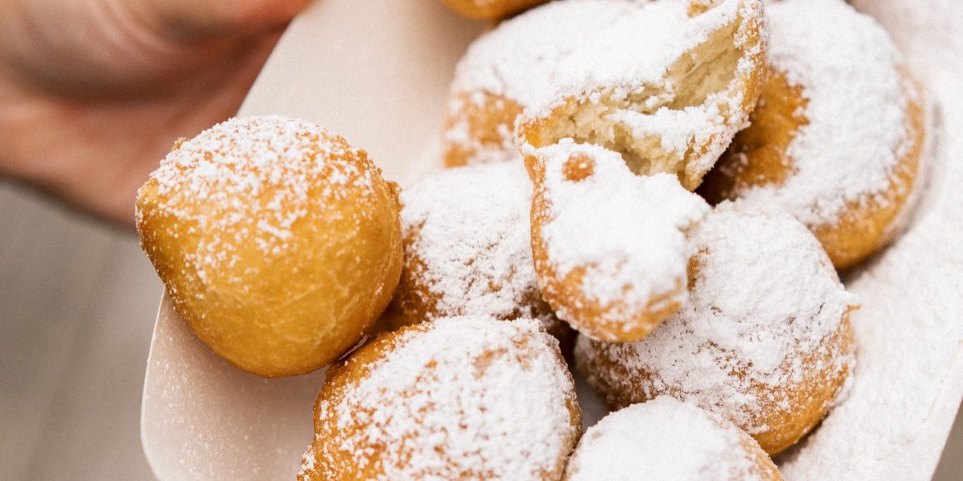 Picture of a person holding fried Oreos served at Midway &amp; Pavilion on Jenkinson's Boardwalk