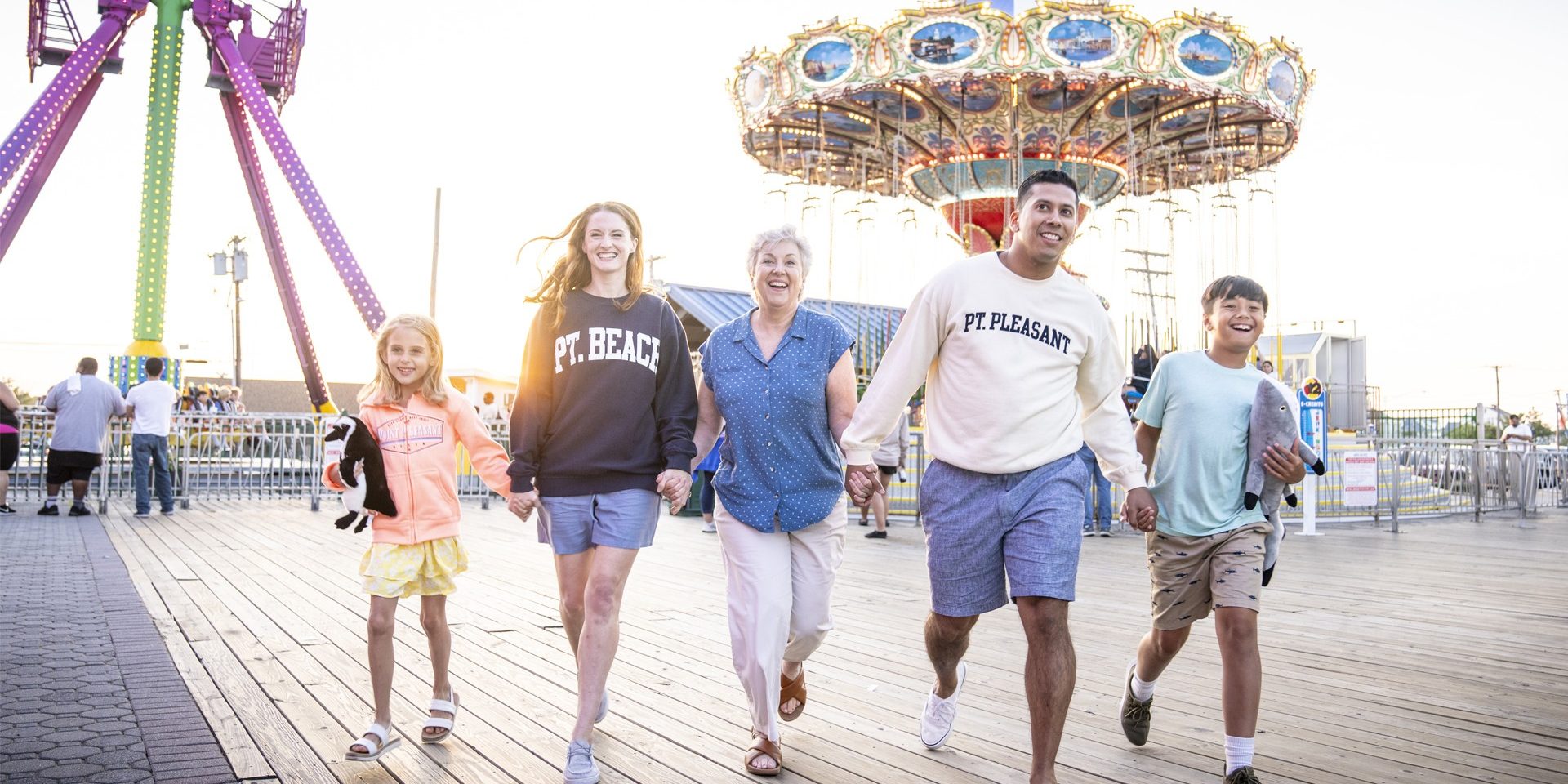 a family walking in the amusement park